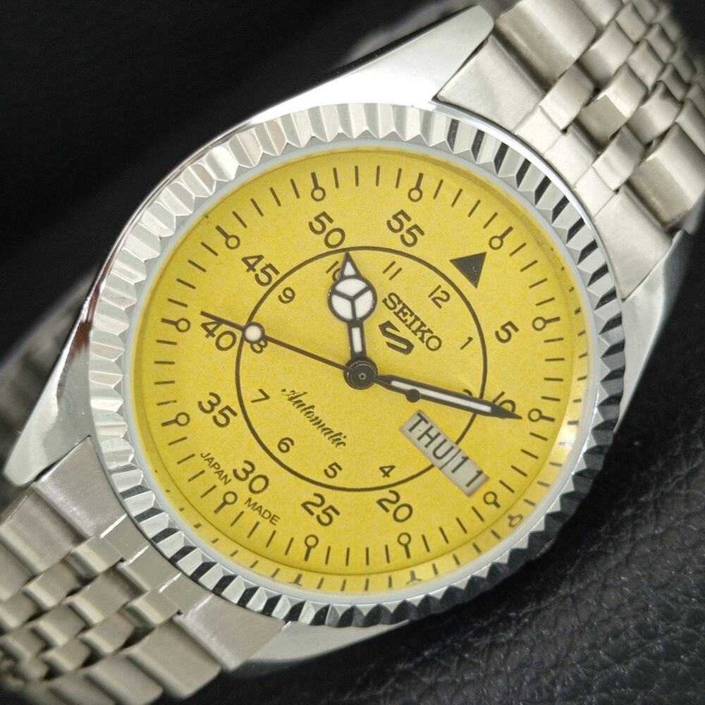 Vintage 1985 Seiko Automatic Mens Silver Watch W/daydate & Yellow accents
